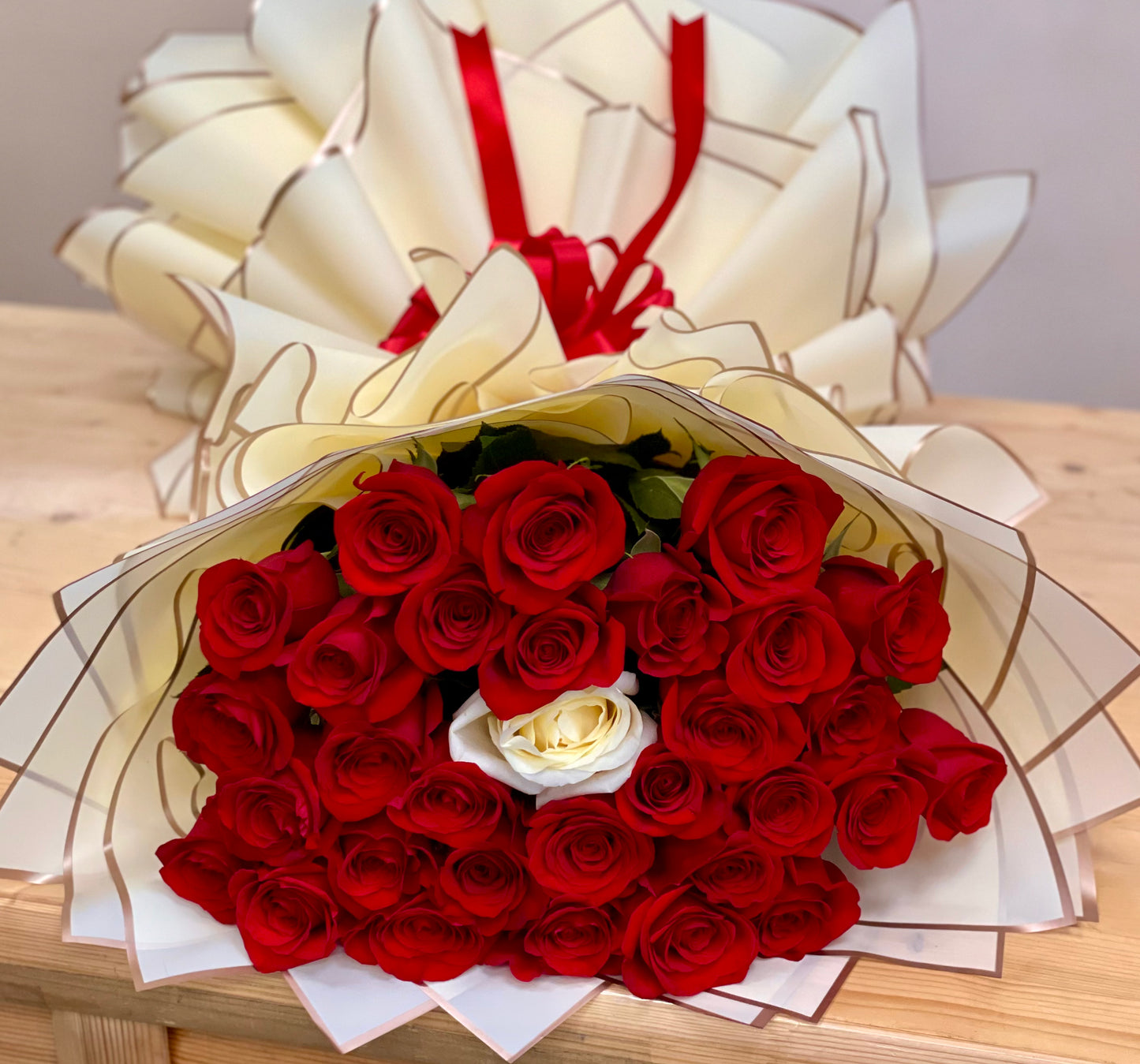 Red Rose Bouquet with a White Accent